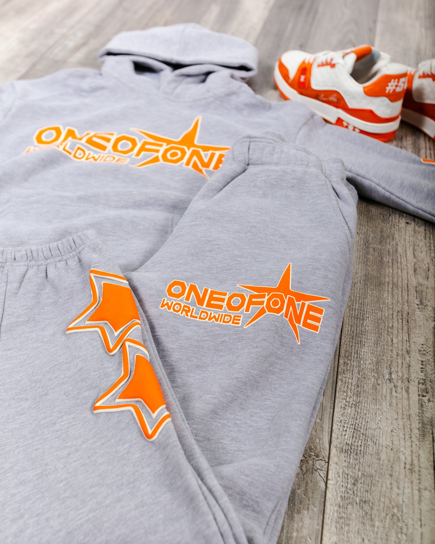 ONE OF ONE ORANGE STAR SWEATSUIT